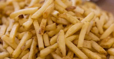 McDonald's cuts free fries for National French Fry Day with $1 purchase