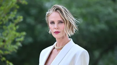 August Theron joins rare The Odyssey premiere outing with Charlize Theron