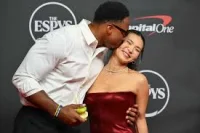 Myles Garrett kisses Chloe Kim at 2026 ESPYS red carpet