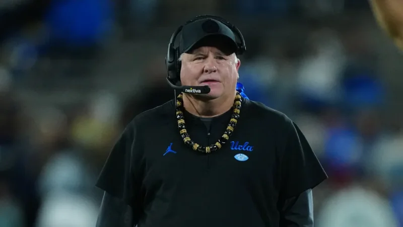 Chip Kelly’s purple vest and hard hat at Northwestern capture a bigger story