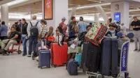 FAA issues ground stops as Flight Cancellations top 2,000 Tuesday