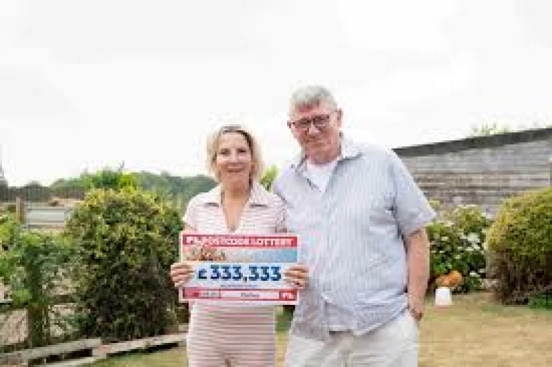 Rebecca Andrews and David Docherty win £333,333 in Couple Postcode Lottery Win