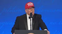 President Donald Trump reveals Trump 2028 cap at WHCA dinner