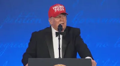 President Donald Trump reveals Trump 2028 cap at WHCA dinner