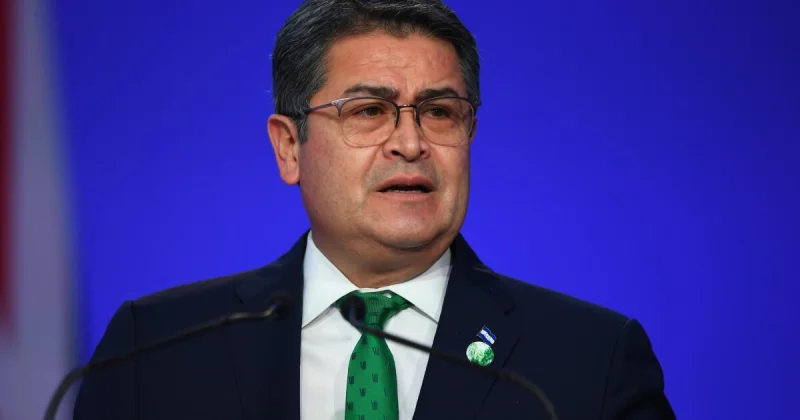 Juan Orlando Hernández returns to Honduras after warrant suspension