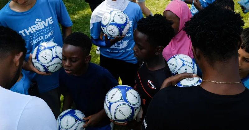 Spokane Velocity visits refugee-focused Youth Soccer camp at Franklin Park