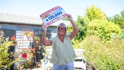 Julie Hopwood wins £125,000 in Postcode Lottery Winning Streets