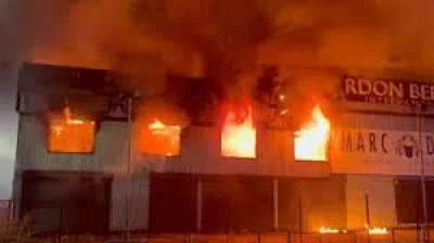 Marc Darcy fire guts Salford outlet on Bury New Road