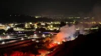 Los Angeles County firefighters battle Tasha Fire near Newhall Pass