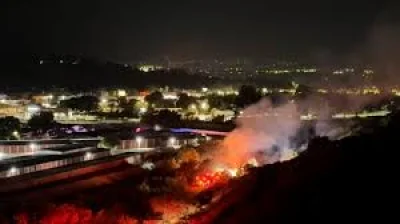 Los Angeles County firefighters battle Tasha Fire near Newhall Pass