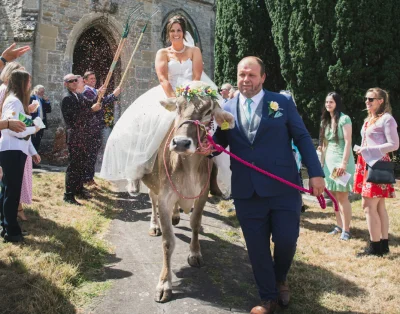 Victoria Lee Rides White Chocolate Button Cow to Wedding in Somerset