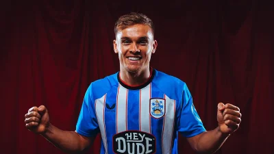Archie Collins signs two-year Huddersfield Town deal as Terriers add a proven midfield organiser