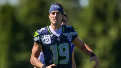 Jake Bobo carted off with apparent right leg injury during Seahawks-Titans joint practice