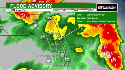 Aaron Christiansen cleans up after St. Lucie County Tornado Warning
