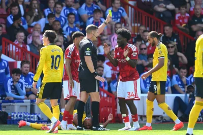 Ola Aina’s James Justin challenge should have stayed a yellow — and Mike Dean is right to say so