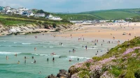 RNLI lifeguards rescue 11 at Porth Beach Newquay Swimmer Rescue