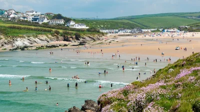 RNLI lifeguards rescue 11 at Porth Beach Newquay Swimmer Rescue