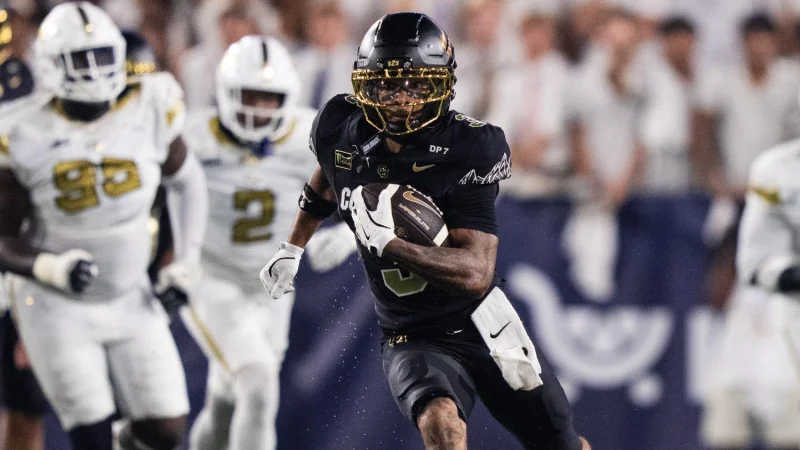 Georgia Score: Colorado edge Georgia Tech 14-13 on Julian Lewis touchdown and Boo Carter block