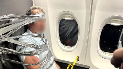 Arthur Lundeen restrained on Passenger Duct-taped Plane after Baltimore diversion
