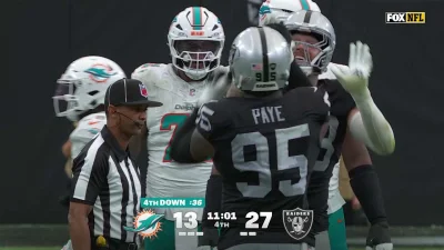Kwity Paye and Maxx Crosby combine for an 8-yard sack of Malik Willis