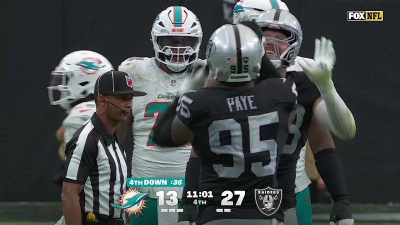 Kwity Paye and Maxx Crosby combine for an 8-yard sack of Malik Willis