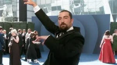 Noah Kahan poses at E! Glambot ahead of 2026 Emmy Awards
