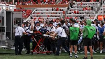 Harrison Taggart taken off in ambulance after second-quarter collision