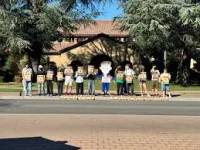 Arin Iverson leads Stanford Defcon protest outside Encina Commons