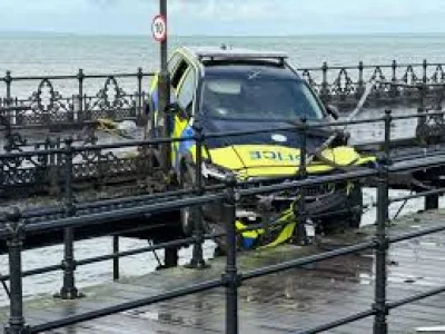 Hampshire & Isle of Wight Constabulary car wedges over Ryde Pier