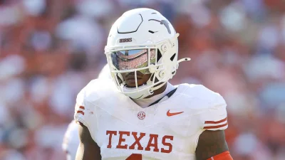Colin Simmons carted off after apparent lower-body injury in Texas Game against Florida