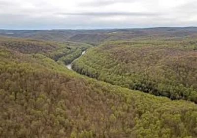Bob Baker identifies Gail Luck in Great Allegheny Passage landslide