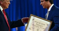 Joe Mitchell gives Trump Man of the Century Award in Sioux City