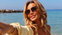 Amanda Holden shares Abu Dhabi bikini photos as Storm Austen rages