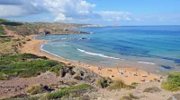 British grandmother dies rescuing granddaughter at Menorca beach