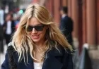 Sienna Miller Elevates High Street Fashion with Chic Coat and Jeans Ensemble