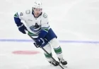 Canucks’ Quinn Hughes Sidelined with Lower-Body Injury Against Oilers