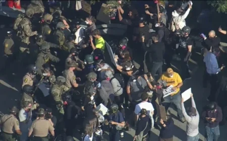 DHS Sec. Noem, BP Cmdr. Bovino Seen During Chicago ICE Facility Protest