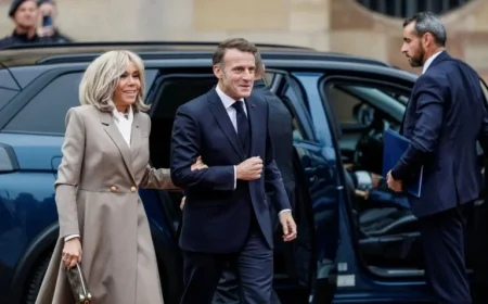 Brigitte and Emmanuel Macron Radiate Smiles at Busy Day’s Start
