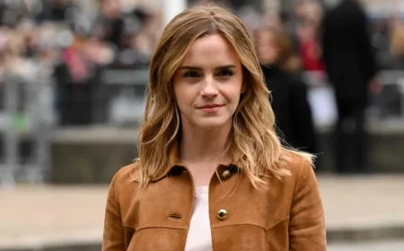 Emma Watson Stuns with Diamond Ring and Minidress at Paris Fashion Week