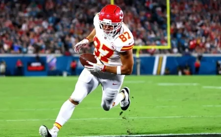 Travis Kelce’s Controversial Touchdown Highlights Chiefs’ Win Amid Swift Album Buzz