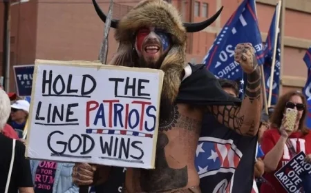 ‘QAnon Shaman Sues Trump for $40 Trillion to Change America’