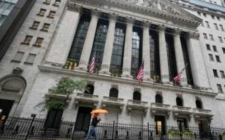 Wall Street Climbs, Ending Best Week in Two Months as Bank Stocks Stabilize