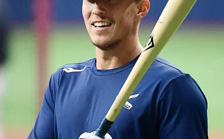 Tommy Edman Shares Insights on March Amid Ankle Injury with Dodgers