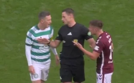 Callum McGregor Clashes with Cammy Devlin in First-Half Tension