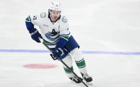 Canucks’ Quinn Hughes Sidelined with Lower-Body Injury Against Oilers