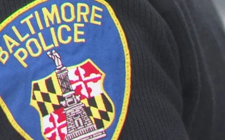 Baltimore Officer Suspended After Viral Video Shows Civilian Run-Over Attempt