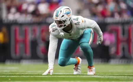 Dolphins’ Chop Robinson Leaves Game Due to Concerning Head Injury