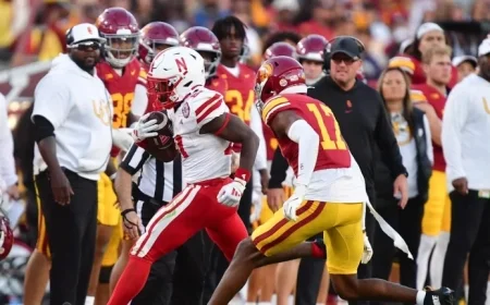 HuskerMax Predicts Narrow USC Victory Over Nebraska in Blackout Game