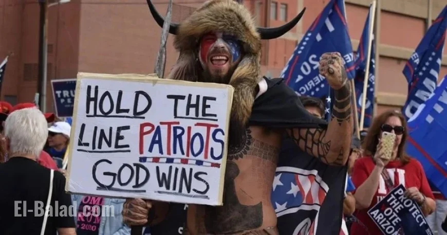 ‘QAnon Shaman Sues Trump for $40 Trillion to Change America’
