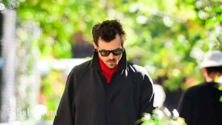 Harry Styles Elevates Fall Look with a Striking Red Accent